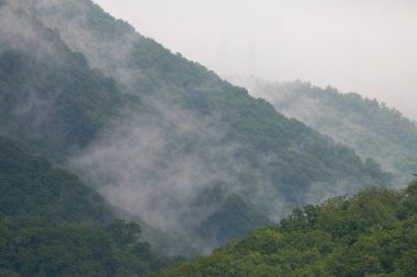 gökyüzü, bulut ve dağ.