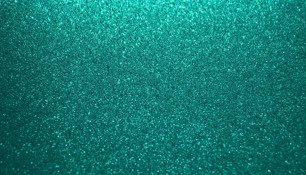 Turquoise shiny glitter texture background