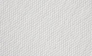 Beyaz kumaş dokusu yakın. Kabataslak tuval arka planı