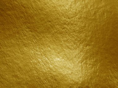 Vurguları ve düzensiz dokusu olan altın folyo arkaplan