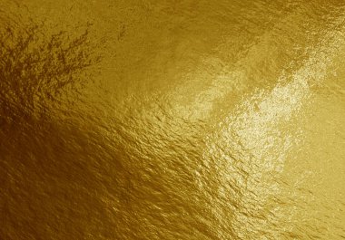 Vurguları ve düzensiz dokusu olan altın folyo arkaplan