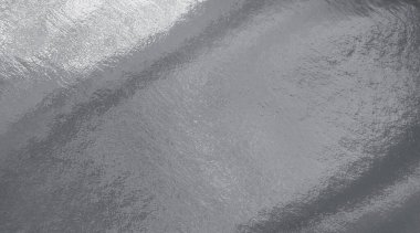 Vurguları ve düz olmayan yüzeyi olan gümüş folyo dokusu