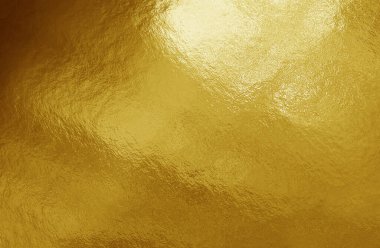 Vurguları ve düzensiz dokusu olan altın folyo arkaplan