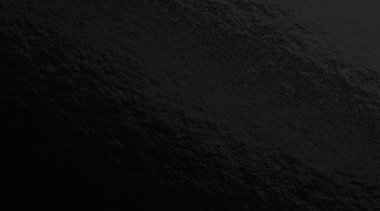 Düz olmayan yüzeyi olan siyah folyo gradyan arkaplan