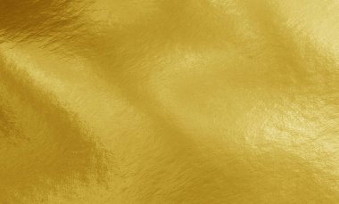Gölgeler, röfleler ve düz olmayan yüzeyi olan altın folyo dokusu
