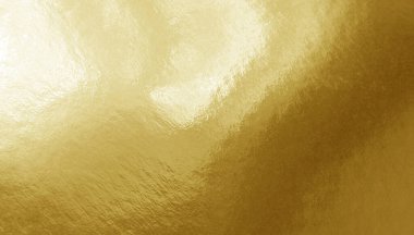 Gölgeler, röfleler ve düz olmayan yüzeyi olan altın folyo dokusu