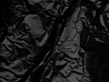 Kırışık siyah folyo doku arkaplanı