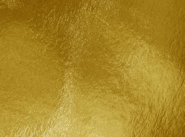 ハイライトと凹凸感のある金箔の背景 — ストック写真