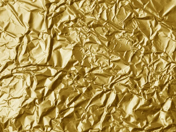 Metallic shiny gold foil texture background