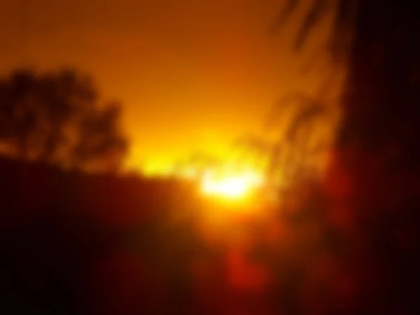 Imagem Desfocada Árvores Fundo Pôr Sol Com Efeito Bokeh — Fotografia de Stock