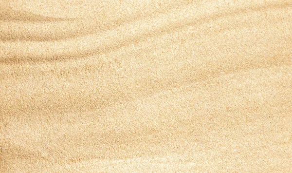 波ベージュ砂のテクスチャの背景 — ストック写真