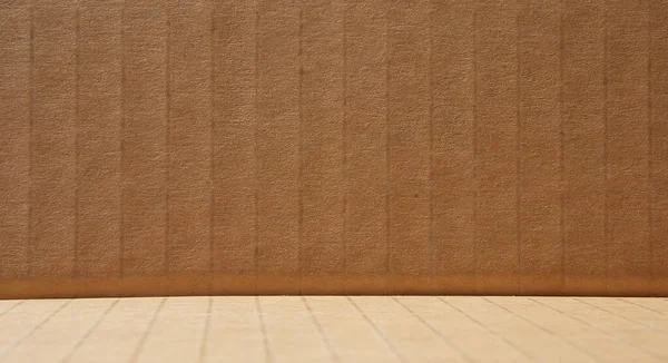 Striped cardboard corner background. Brown recycled packaging cardboard