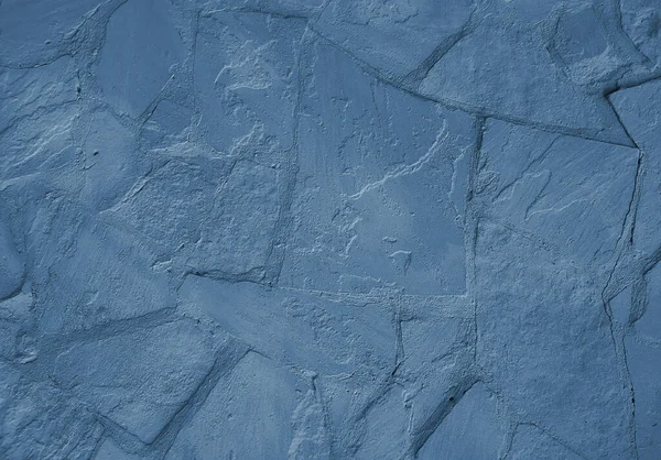 Blue stone textured wall. Grunge background