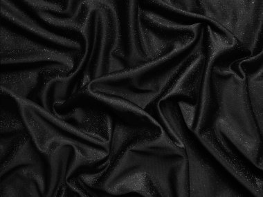 Parlak siyah buruşuk kumaş dokusu. Zarif kumaş arkaplan