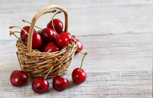 Red cherries in a basket — Stock Photo, Image