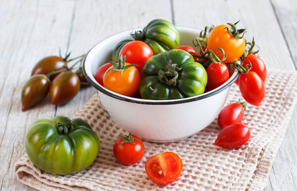 Colorful tomatoes in a bowl