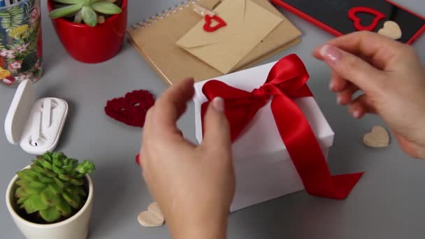 Somebody Unties Bow Valentine Day Gift — Stock Video