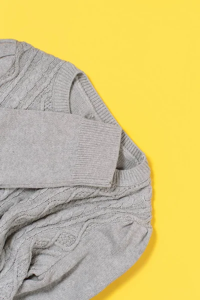 Grey Sweater Yellow Background Top View — Stock Photo, Image