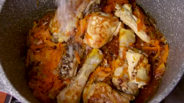 Somebody Sprinkling Salt Chicken Pieces Frying Pan Close — Stock Video
