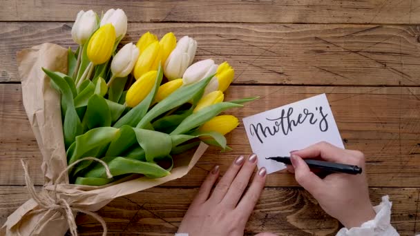 Writing Card Mothers Day Wooden Table Tulips Bouquet Top View — Stock Video