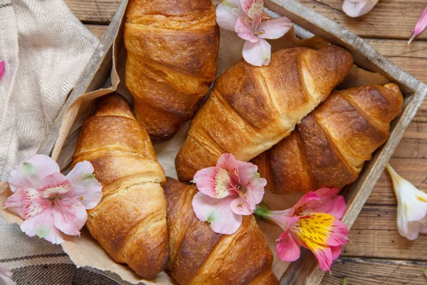 Fresh Croissants Flowers Tray Wooden Table Top View — Stock Photo, Image