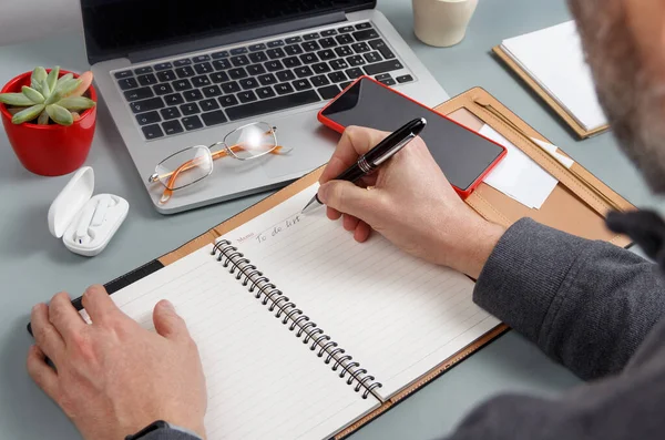 Man Writing Agenda List Laptop Grey Office Desk Close Business — Stock Photo, Image