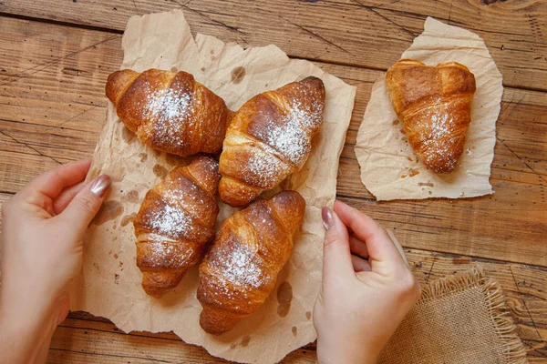 Hands Taking French Fresh Crusty Croissants Wooden Table — Stock Photo, Image