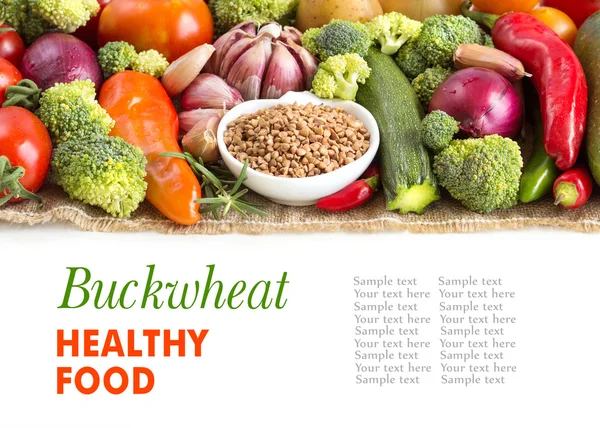 Raw buckwheat and vegetables — Stock Photo, Image