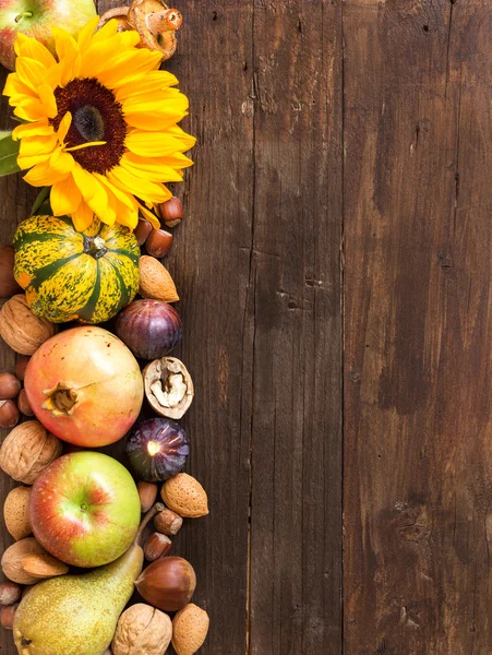 Autumn border on a wooden table