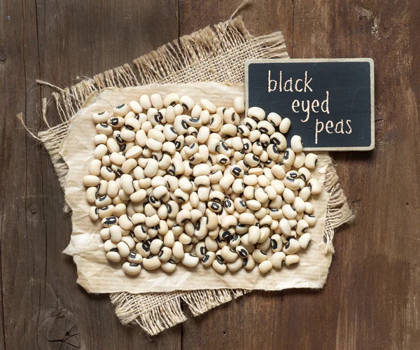 Black eyed peas with small  chalkboard — Stock Photo, Image