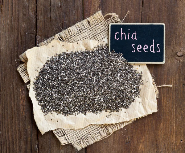 Chia seeds with small chalkboard — Stock Photo, Image