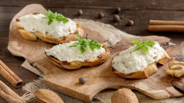 Toasted bread with a salted codfish mousse clipart