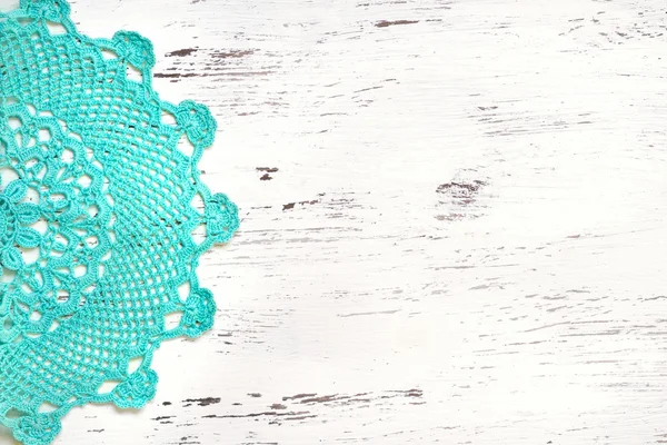 Crochet doily border over shabby chic wood — Stock Photo, Image