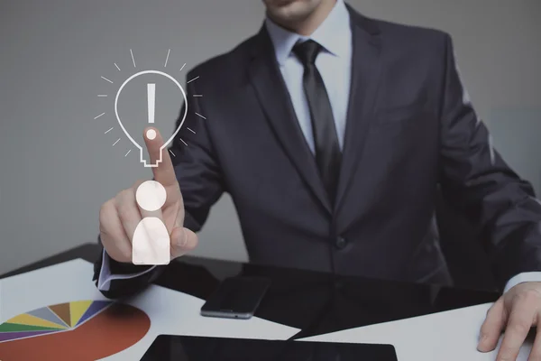 Businessman presses the sign idea. business and technology concept — Stock Photo, Image