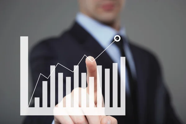 Businessman Touching a Graph Indicating Growth — Stock Photo, Image