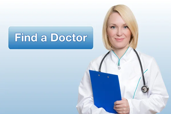 Beautiful female doctor holding clipboard smiling — Stock Photo, Image