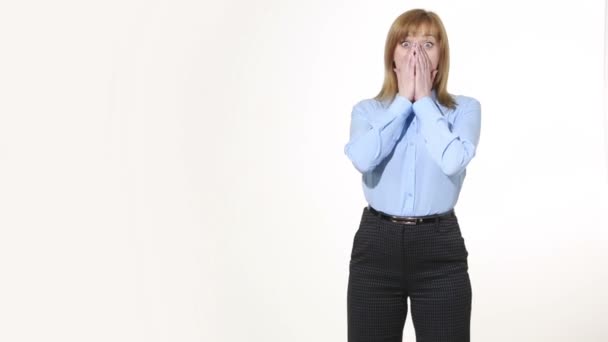 Girl covering her mouth with her hands. girl in pants and blous.  Isolated on white background. body language. women gestures. nonverbal cues — Stockvideo