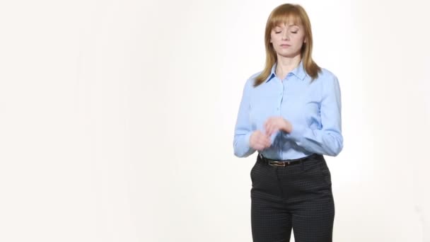 Corrects cuff. girl in pants and blous.  Isolated on white background. body language. women gestures. nonverbal cues — Stock Video