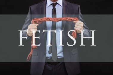 iş kıyafeti zincirleme elleri olan bir adam. kelepçe seks oyunları için. erotik eğlence kavramı.