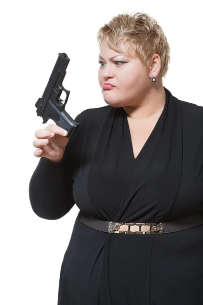 Dicke Frau mit Waffe. — Stockfoto