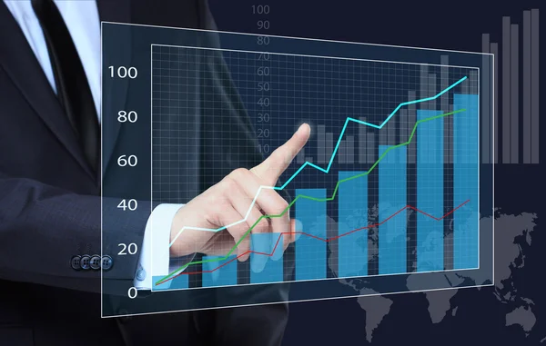 Бизнесмен трогает график, указывающий на рост. бизнес концепция — стоковое фото