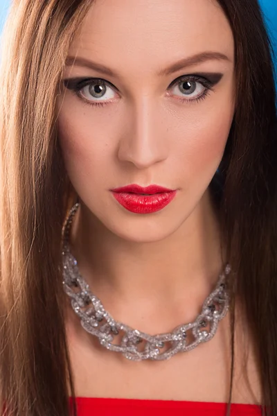 Necklace on female neck. girl holding hands. sexy red lips. — Stock Photo, Image