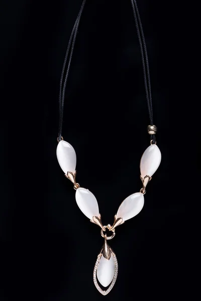 Necklace on a black background. gems. — Stock Photo, Image