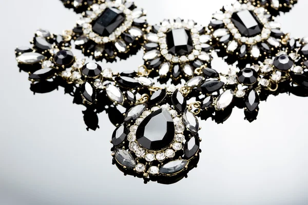 Necklace on a black background. gems. — Stock Photo, Image
