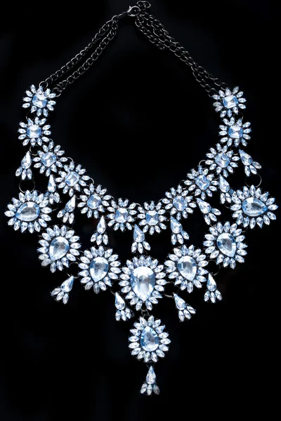 Blue necklace on a black background. gems. — Stock Photo, Image