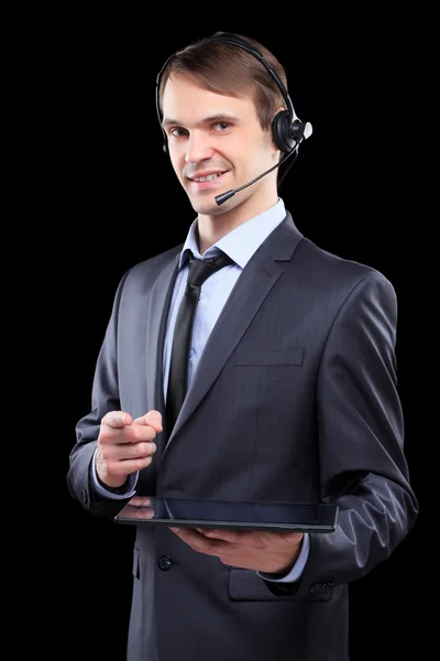 Affärsman med headset och tablett. — Stockfoto