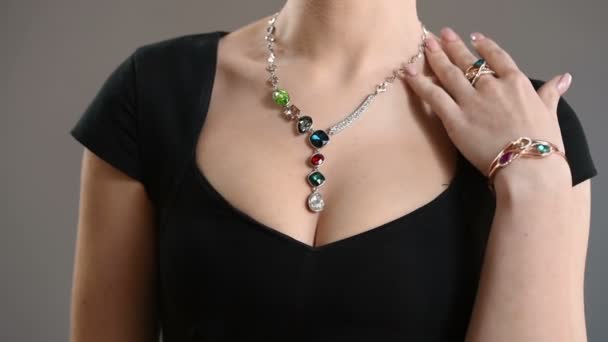 Necklace on the neck. breast closeup — Stock Video