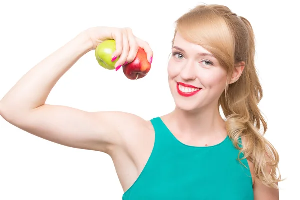 Menina bonita come um verde e maçãs vermelhas no branco — Fotografia de Stock