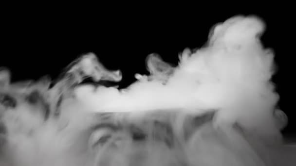 Extreme close-up, detailed. thick white steam from dry ice on a black background — Stock Video