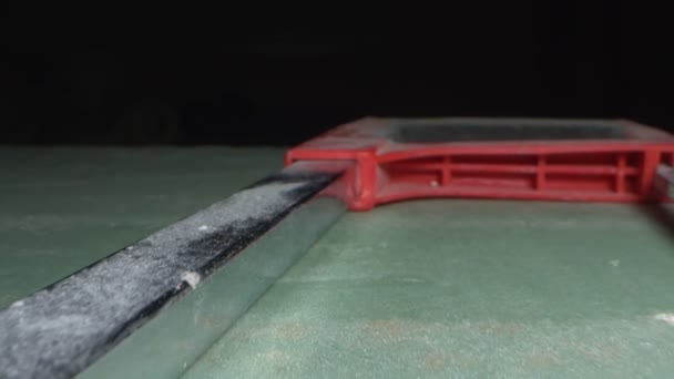 Extremely close-up, detailed. hacksaw on a dark background — Stock Video